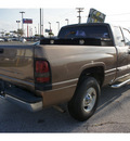 dodge ram pickup 1500 2000 beige pickup truck slt gasoline v8 rear wheel drive automatic 77037