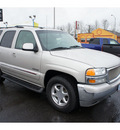 gmc yukon 2004 gold suv flex fuel 8 cylinders 4 wheel drive automatic 98632