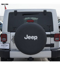 jeep wrangler unlimited 2012 silver suv sahara gasoline 6 cylinders 4 wheel drive automatic 77090