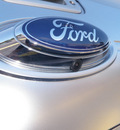 ford f 150 2011 silver platinum flex fuel 8 cylinders 4 wheel drive automatic 32401