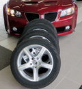pontiac g8 2009 red sedan gt gasoline 8 cylinders rear wheel drive automatic 55124
