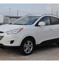 hyundai tucson 2011 white gls gasoline 4 cylinders all whee drive automatic 77037