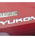 gmc yukon 2009 red suv denali gasoline 8 cylinders 2 wheel drive automatic 77388