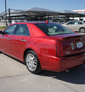 cadillac sts 2011 red sedan gasoline 6 cylinders rear wheel drive automatic 76087