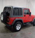 jeep wrangler 2005 red suv rubicon gasoline 6 cylinders 4 wheel drive 6 speed manual 76108