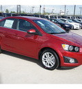 chevrolet sonic 2012 red gasoline 4 cylinders front wheel drive 6 spd auto connivity plus 77090