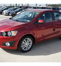 chevrolet sonic 2012 red gasoline 4 cylinders front wheel drive 6 spd auto connivity plus 77090