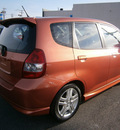 honda fit 2007 orange hatchback 4 cylinders automatic 13502