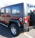 jeep wrangler unlimited 2009 red suv x gasoline 6 cylinders 4 wheel drive 6 speed manual 13502