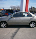 nissan sentra 2006 gold sedan 4 cylinders automatic with overdrive 13502