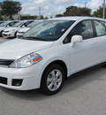 nissan versa 2012 white hatchback s gasoline 4 cylinders front wheel drive automatic 33884