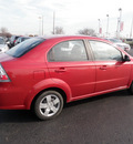 chevrolet aveo 2010 red sedan lt gasoline 4 cylinders front wheel drive automatic 19153