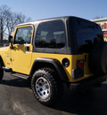 jeep wrangler 2000 yellow suv sport gasoline 6 cylinders 4 wheel drive automatic 61008