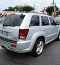 jeep grand cherokee 2007 silver suv srt 8 gasoline 8 cylinders 4 wheel drive automatic 33021