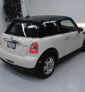 mini cooper 2011 off white hatchback gasoline 4 cylinders front wheel drive 6 speed manual 91731