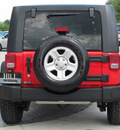 jeep wrangler 2009 red suv unlimited x gasoline 6 cylinders 4 wheel drive automatic 33884