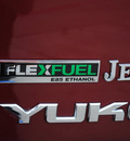 gmc yukon 2011 red suv slt flex fuel 8 cylinders 4 wheel drive automatic 76087