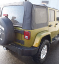 jeep wrangler unlimited 2007 green suv sahara gasoline 6 cylinders 4 wheel drive 6 speed manual 98371