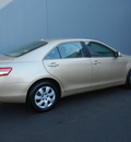 toyota camry 2011 tan sedan le gasoline 4 cylinders front wheel drive automatic 55448