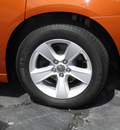 dodge charger 2011 orange sedan gasoline 6 cylinders rear wheel drive automatic 32447