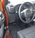jeep wrangler 2011 orange suv sport gasoline 6 cylinders 4 wheel drive automatic 98371