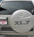suzuki xl7 2005 beige suv gasoline 6 cylinders 4 wheel drive not specified 43228