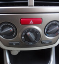 subaru impreza 2009 red hatchback 2 5i gasoline 4 cylinders all whee drive 5 speed manual 45324