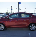 chevrolet sonic 2012 red gasoline 4 cylinders front wheel drive 6 spd auto lpo,cargo net 77090