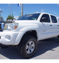 toyota tacoma 2006 white v6 gasoline 6 cylinders 4 wheel drive automatic 33157