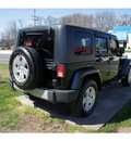 jeep wrangler unlimited 2010 black suv sahara gasoline 6 cylinders 4 wheel drive automatic with overdrive 07712