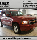 chevrolet tahoe 2011 dk  red suv lt flex fuel 8 cylinders 4 wheel drive automatic with overdrive 55391