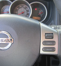 nissan versa 2009 lt  blue hatchback 1 8 sl gasoline 4 cylinders front wheel drive automatic 33157