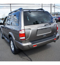 nissan pathfinder 2002 brown suv se gasoline 6 cylinders 4 wheel drive automatic with overdrive 08902