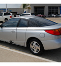 saturn s series 2002 silver coupe sc2 gasoline 4 cylinders front wheel drive automatic 77065