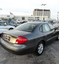 ford taurus 2003 dk  gray sedan sel gasoline 6 cylinders front wheel drive automatic with overdrive 60546