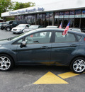 ford fiesta 2011 dk  gray hatchback ses gasoline 4 cylinders front wheel drive automatic 33021