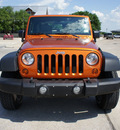 jeep wrangler 2010 orange suv rubicon gasoline 6 cylinders 4 wheel drive automatic with overdrive 76087