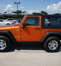 jeep wrangler 2010 orange suv rubicon gasoline 6 cylinders 4 wheel drive automatic with overdrive 76087