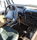 jeep wrangler 2001 white suv sahara gasoline 6 cylinders 4 wheel drive 5 speed manual 60915