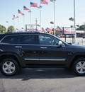 jeep grand cherokee 2011 dk  gray suv overland gasoline 8 cylinders 4 wheel drive automatic 33021