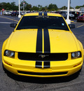 ford mustang 2006 yellow coupe gasoline 6 cylinders rear wheel drive 5 speed manual 33021