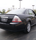 ford taurus 2009 black sedan limited gasoline 6 cylinders front wheel drive automatic 61008
