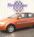 chevrolet aveo 2005 orange hatchback ls gasoline 4 cylinders front wheel drive automatic 80905