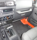 jeep wrangler 2006 orange suv unlimited gasoline 6 cylinders 4 wheel drive automatic 60443