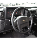 jeep wrangler 2006 jeep green suv se gasoline 4 cylinders 4 wheel drive 6 speed manual 07724