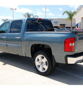 chevrolet silverado 1500 2011 green lt flex fuel 8 cylinders 2 wheel drive automatic with overdrive 77065