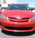 toyota corolla 2011 red sedan l gasoline 4 cylinders front wheel drive 5 speed manual 34788