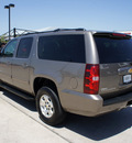 chevrolet suburban 2012 brown suv lt flex fuel 8 cylinders 4 wheel drive automatic 76087