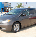 honda odyssey 2012 brown van touring elite gasoline 6 cylinders front wheel drive 6 speed automatic 77065