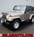 jeep wrangler 2004 beige suv sahara gasoline 6 cylinders 4 wheel drive automatic with overdrive 98371